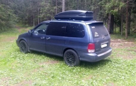 KIA Sedona II рестайлинг, 2002 год, 600 000 рублей, 3 фотография