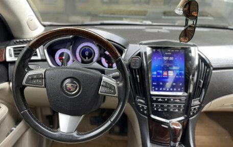 Cadillac SRX II рестайлинг, 2010 год, 1 100 000 рублей, 16 фотография