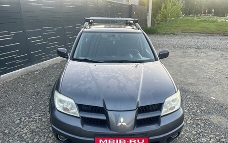 Mitsubishi Outlander III рестайлинг 3, 2007 год, 900 000 рублей, 2 фотография