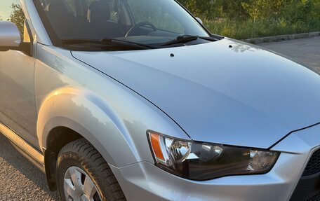 Mitsubishi Outlander III рестайлинг 3, 2011 год, 1 350 000 рублей, 13 фотография
