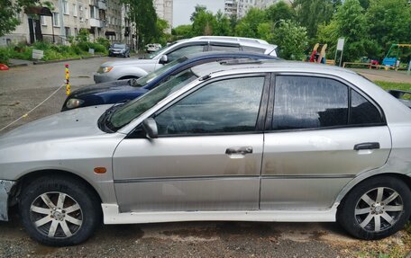 Mitsubishi Mirage VI рестайлинг, 1998 год, 150 000 рублей, 2 фотография