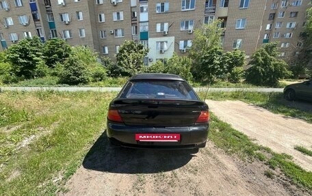 Mazda 323, 1997 год, 180 000 рублей, 4 фотография