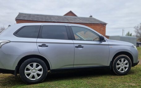 Mitsubishi Outlander III рестайлинг 3, 2013 год, 1 430 000 рублей, 4 фотография
