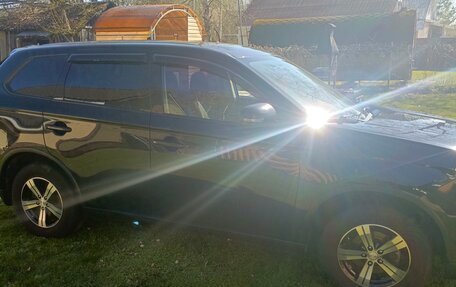 Mitsubishi Outlander III рестайлинг 3, 2014 год, 1 600 000 рублей, 12 фотография
