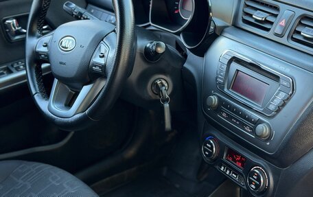 KIA Rio III рестайлинг, 2012 год, 920 000 рублей, 21 фотография