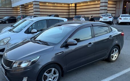 KIA Rio III рестайлинг, 2012 год, 670 000 рублей, 2 фотография