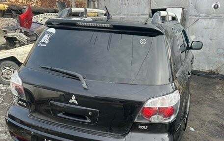 Mitsubishi Outlander III рестайлинг 3, 2005 год, 660 000 рублей, 3 фотография
