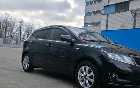 KIA Rio III рестайлинг, 2012 год, 750 000 рублей, 20 фотография