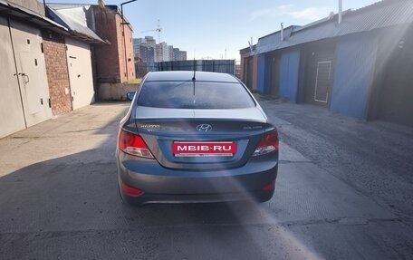 Hyundai Solaris II рестайлинг, 2011 год, 820 000 рублей, 3 фотография