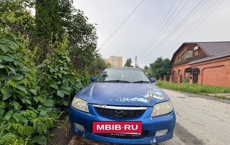 Mazda 323, 2003 год, 199 000 рублей, 9 фотография