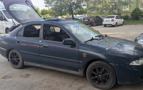 Mitsubishi Carisma I, 1998 год, 85 000 рублей, 3 фотография