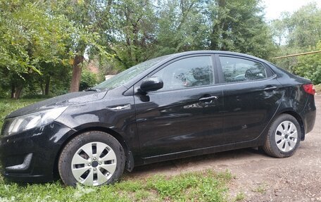 KIA Rio III рестайлинг, 2014 год, 750 000 рублей, 3 фотография