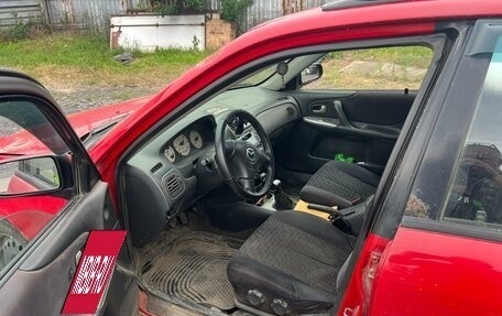 Mazda Protege, 2002 год, 215 000 рублей, 8 фотография