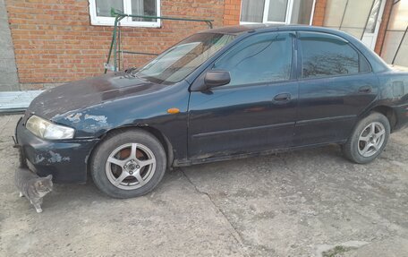 Mazda 323, 1998 год, 100 000 рублей, 4 фотография