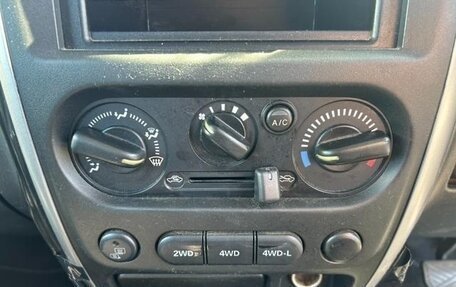 Suzuki Jimny, 2010 год, 550 000 рублей, 13 фотография