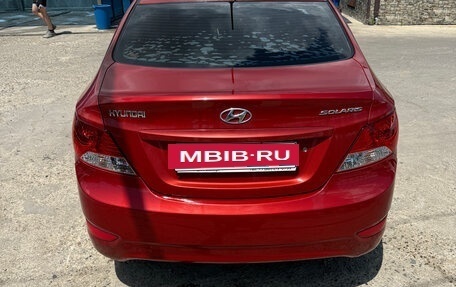 Hyundai Solaris II рестайлинг, 2013 год, 800 000 рублей, 21 фотография