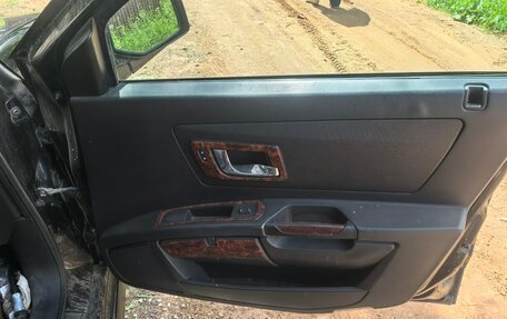 Cadillac SRX II рестайлинг, 2004 год, 120 000 рублей, 13 фотография