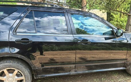 Cadillac SRX II рестайлинг, 2004 год, 120 000 рублей, 14 фотография