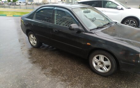 KIA Shuma II, 2004 год, 175 000 рублей, 3 фотография