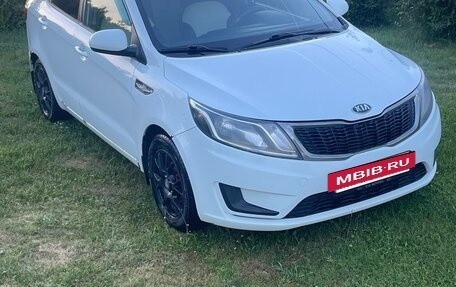 KIA Rio III рестайлинг, 2012 год, 750 000 рублей, 2 фотография