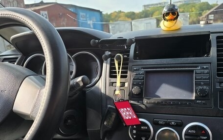Nissan Tiida, 2010 год, 750 000 рублей, 8 фотография