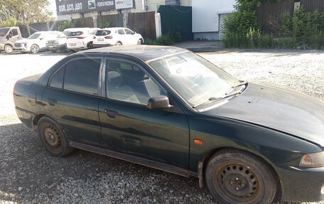 Mitsubishi Lancer VII, 1996 год, 130 000 рублей, 3 фотография