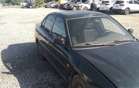 Mitsubishi Lancer VII, 1996 год, 130 000 рублей, 4 фотография