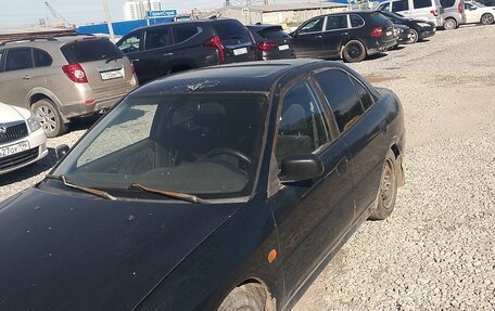 Mitsubishi Lancer VII, 1996 год, 130 000 рублей, 6 фотография