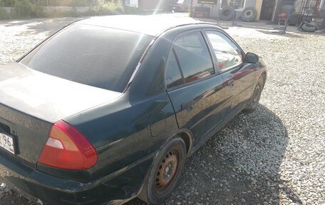 Mitsubishi Lancer VII, 1996 год, 130 000 рублей, 30 фотография