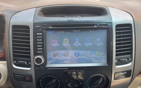 Toyota Land Cruiser Prado 120 рестайлинг, 2004 год, 1 650 000 рублей, 26 фотография