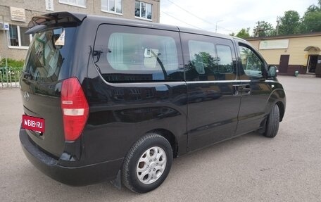 Hyundai Grand Starex Grand Starex I рестайлинг 2, 2011 год, 1 643 754 рублей, 2 фотография