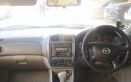 Mazda Familia, 2002 год, 150 000 рублей, 18 фотография