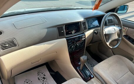 Toyota Corolla, 2003 год, 649 999 рублей, 13 фотография