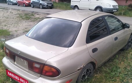 Mazda Protege, 1997 год, 45 000 рублей, 2 фотография