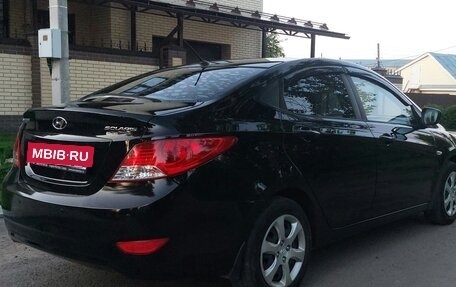 Hyundai Solaris II рестайлинг, 2013 год, 670 000 рублей, 3 фотография