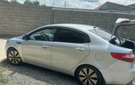 KIA Rio III рестайлинг, 2012 год, 715 000 рублей, 2 фотография