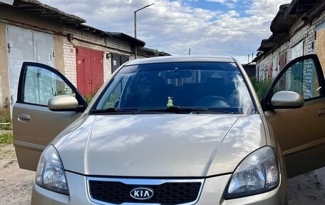 KIA Rio II, 2011 год, 595 000 рублей, 9 фотография