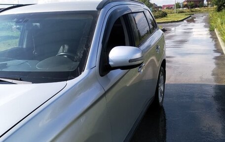 Mitsubishi Outlander III рестайлинг 3, 2013 год, 1 500 000 рублей, 16 фотография