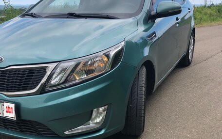 KIA Rio III рестайлинг, 2011 год, 950 000 рублей, 2 фотография