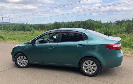KIA Rio III рестайлинг, 2011 год, 950 000 рублей, 15 фотография