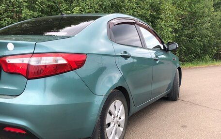 KIA Rio III рестайлинг, 2011 год, 950 000 рублей, 19 фотография