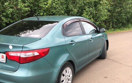 KIA Rio III рестайлинг, 2011 год, 950 000 рублей, 21 фотография