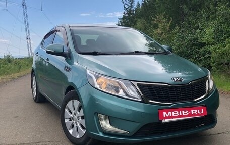 KIA Rio III рестайлинг, 2011 год, 950 000 рублей, 28 фотография