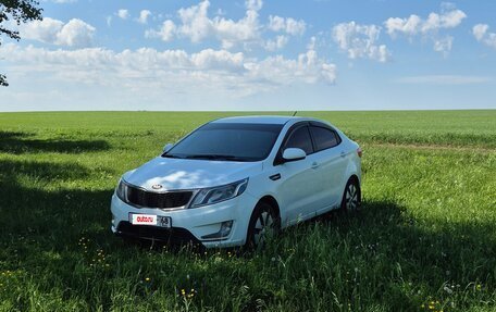 KIA Rio III рестайлинг, 2013 год, 715 000 рублей, 14 фотография