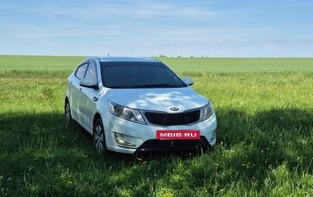 KIA Rio III рестайлинг, 2013 год, 715 000 рублей, 13 фотография