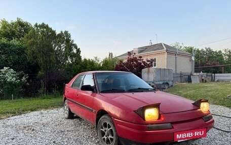 Mazda 323, 1990 год, 300 000 рублей, 3 фотография