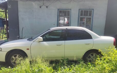 Mitsubishi Mirage VI рестайлинг, 1999 год, 85 000 рублей, 5 фотография