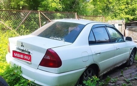 Mitsubishi Mirage VI рестайлинг, 1999 год, 85 000 рублей, 6 фотография
