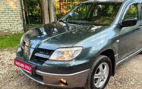 Mitsubishi Outlander III рестайлинг 3, 2005 год, 600 000 рублей, 11 фотография