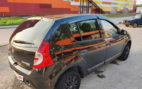 Renault Sandero I, 2013 год, 650 000 рублей, 2 фотография